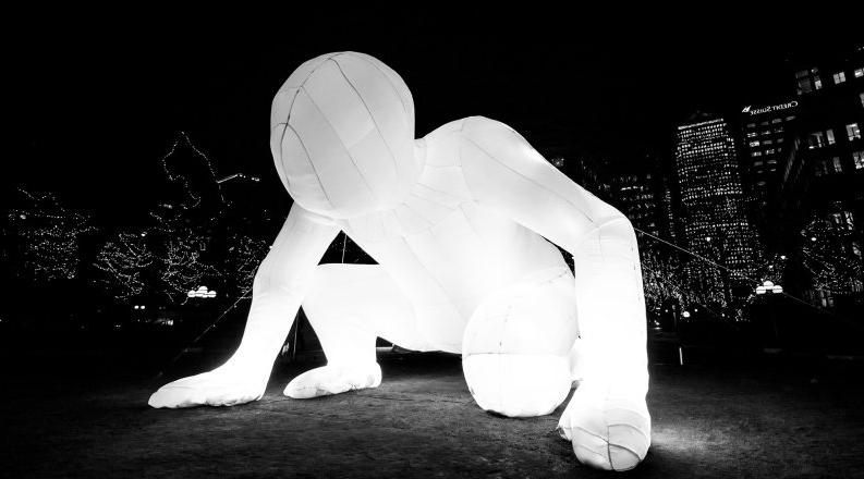 Photo of a giant inflatable human. 