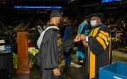 Students could not contain their excitement as they walk off the stage. 图Chuck Thomas/ODU